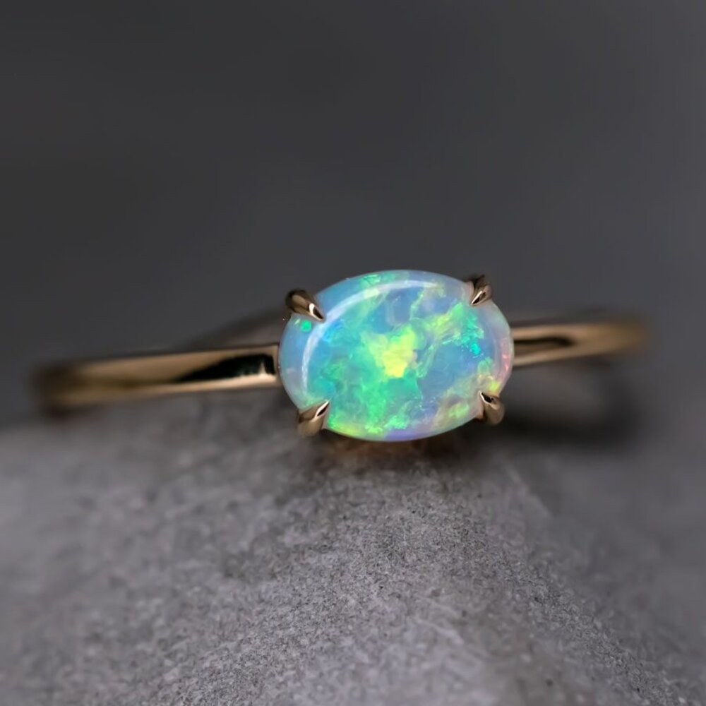 14K Yellow Gold Engagement Ring featuring an Oval Australian Solid Opal